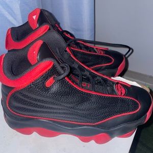 Black and red jordans like brand new